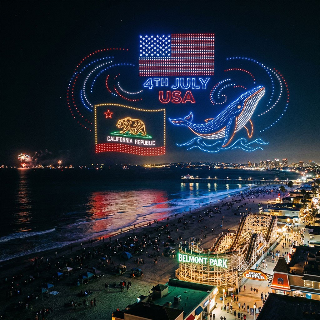 Drone light show over San Diego bay at night